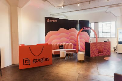 The orange bag desk and coral arch in the lounge