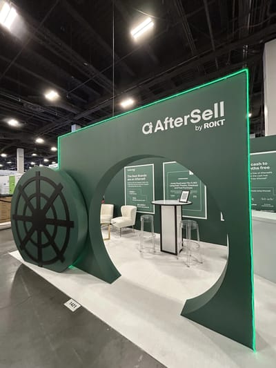 The vault door beside the circular cut-out arch on the show floor