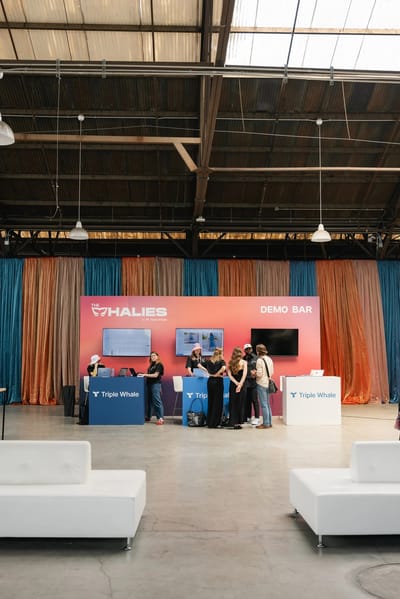 The Whalies Demo Bar under a warehouse roof with velvet curtains behind