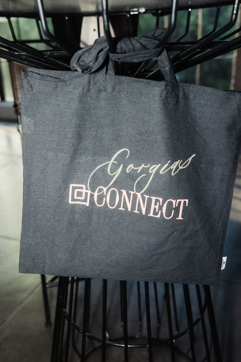Grey canvas tote bag printed with the Gorgias Connect logo
