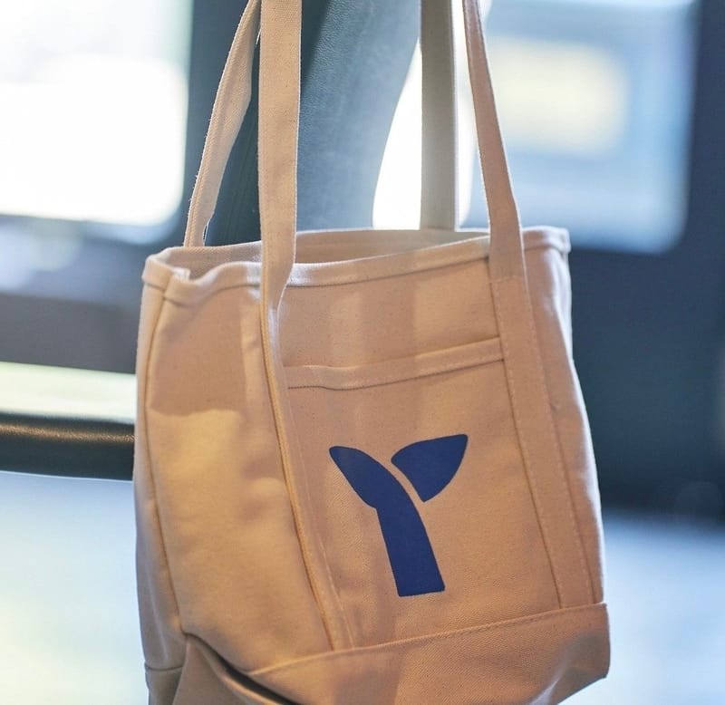 Canvas tote bag printed with the blue Triple Whale logo