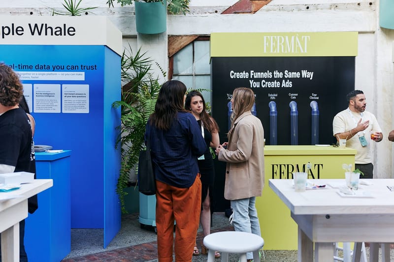Guests talking at the Triple Whale and FERMÀT spaces