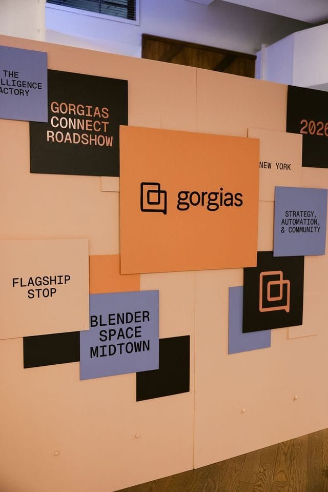 Coral, black and blue wall panels reading Gorgias Connect Roadshow, 2026, New York, Flagship Stop and Blender Space Midtown