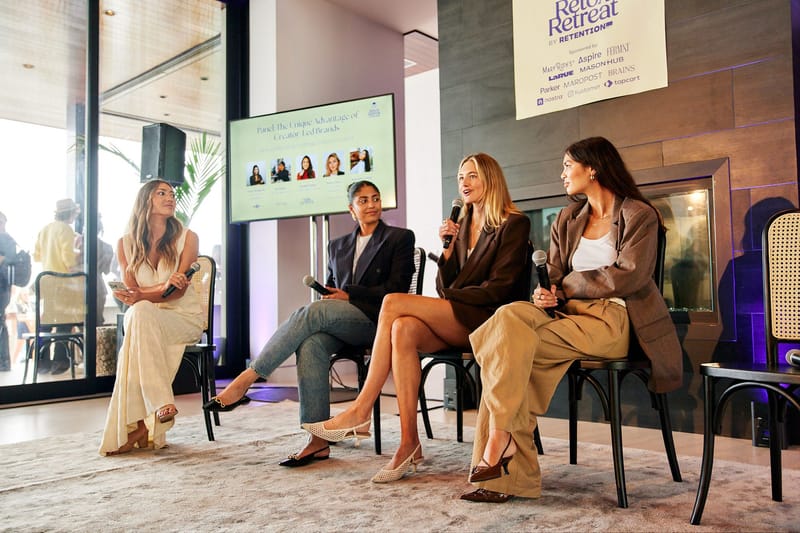 Four speakers seated under a screen reading Panel: The Unique Advantage of Creator-Led Brands