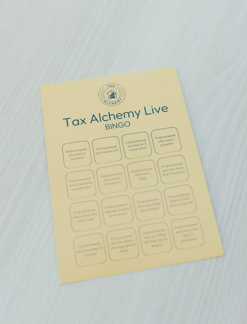 Yellow Tax Alchemy Live Bingo card lying on a white table